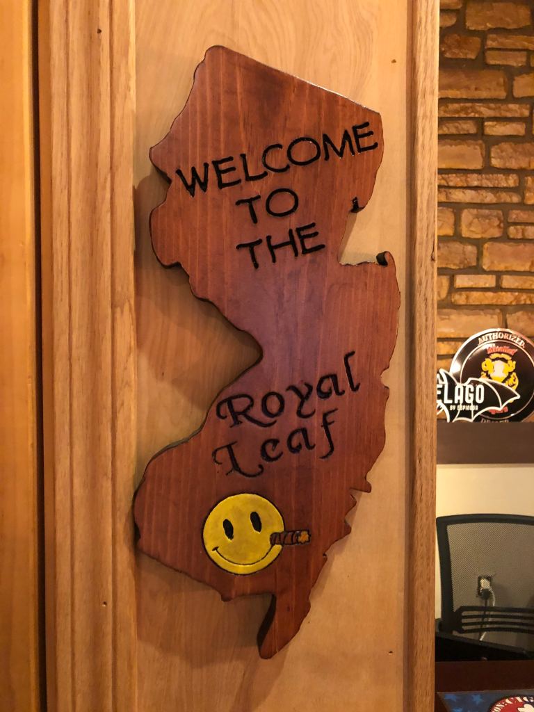 Wooden decoration right next to the humidor door. (Photo/Connor Coles)